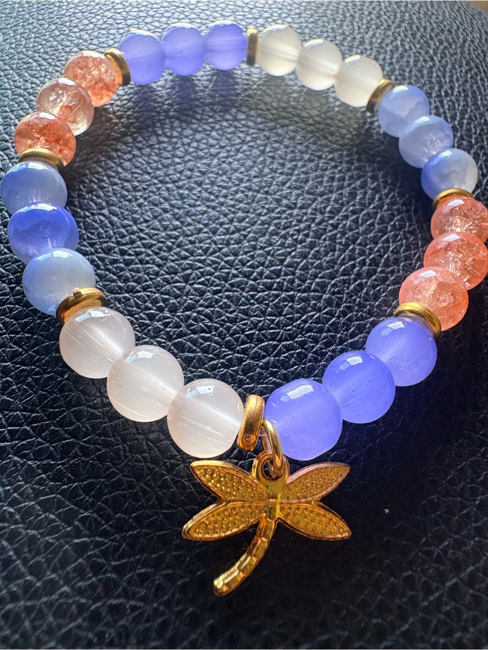 Blue, peach, white clarity bracelet with gold accent and dragonfly charm